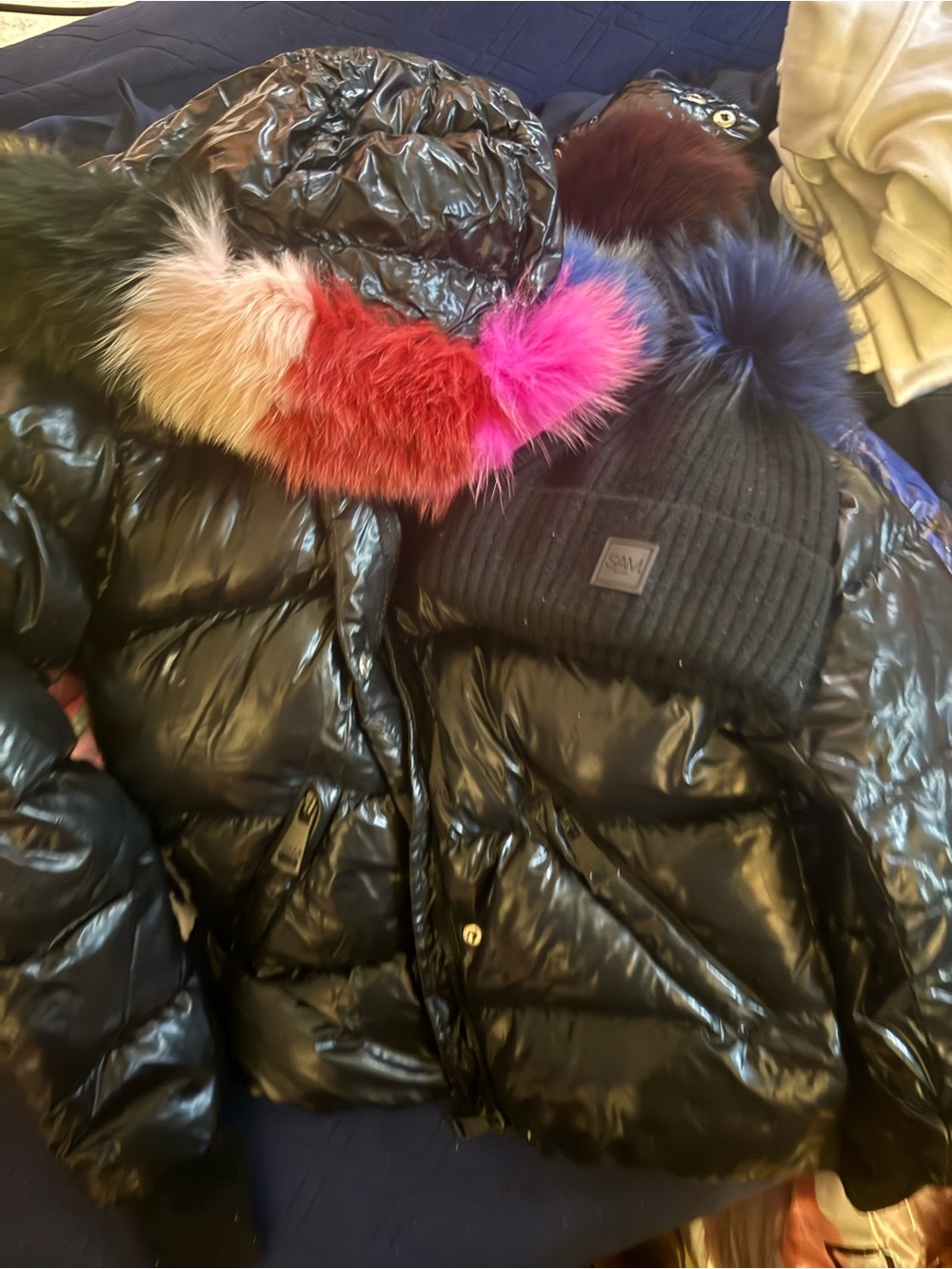 SAM. Black Puffer Jacket with Multicolor Faux Fur Hood Trim